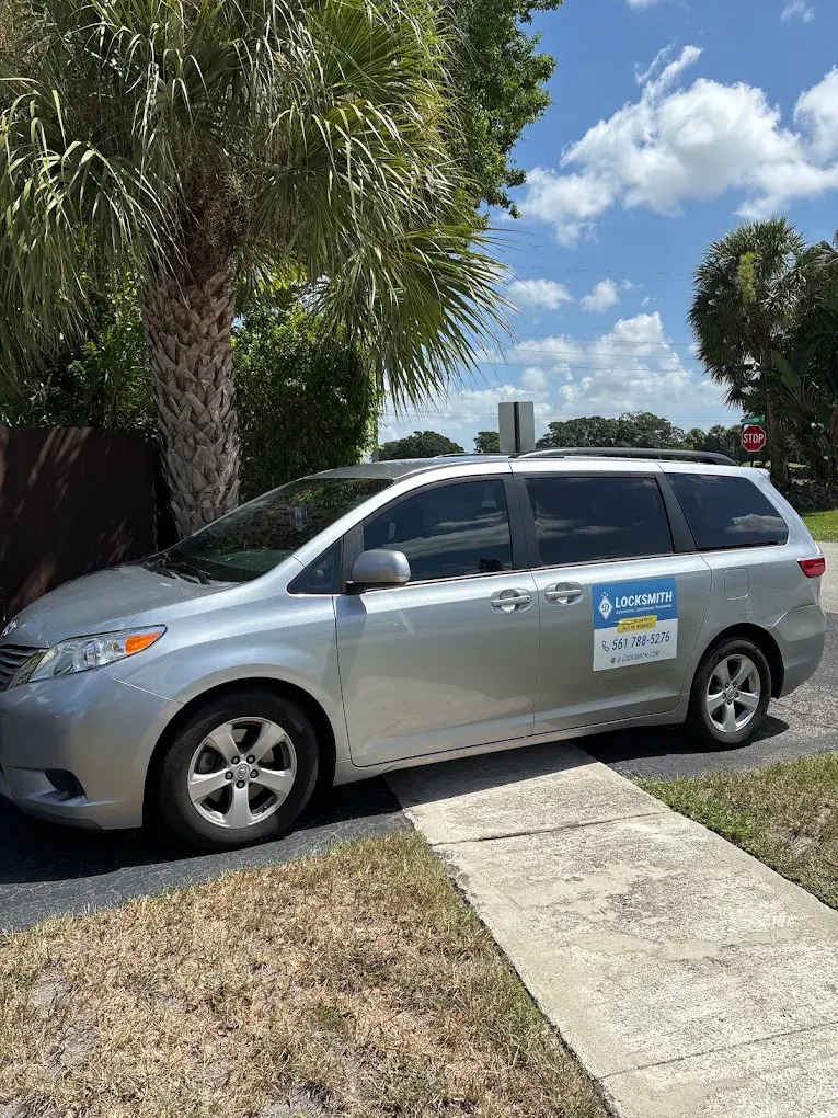D Locksmith service van at a customer's home