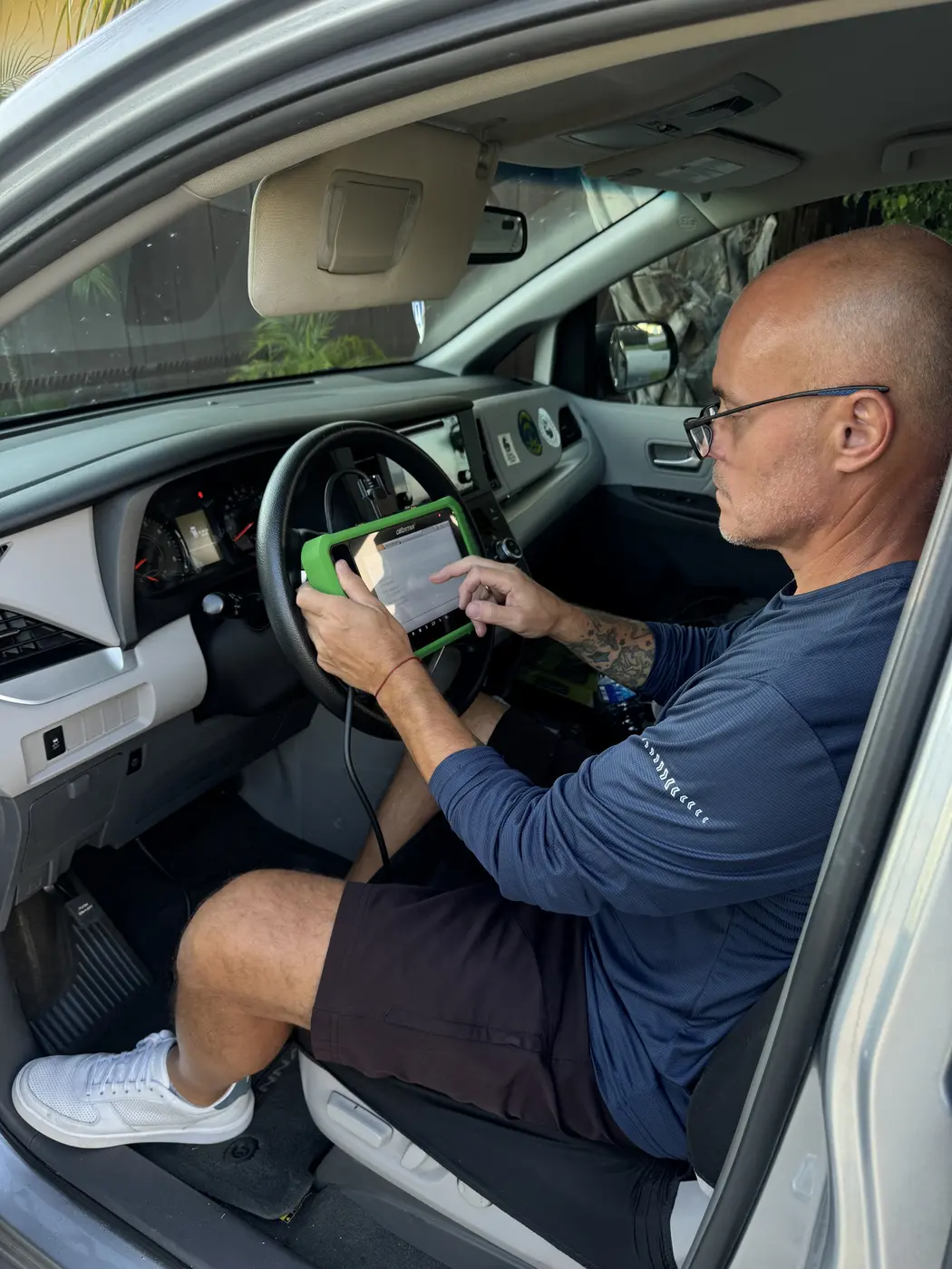 Key programming tablet in a Toyota Sienna